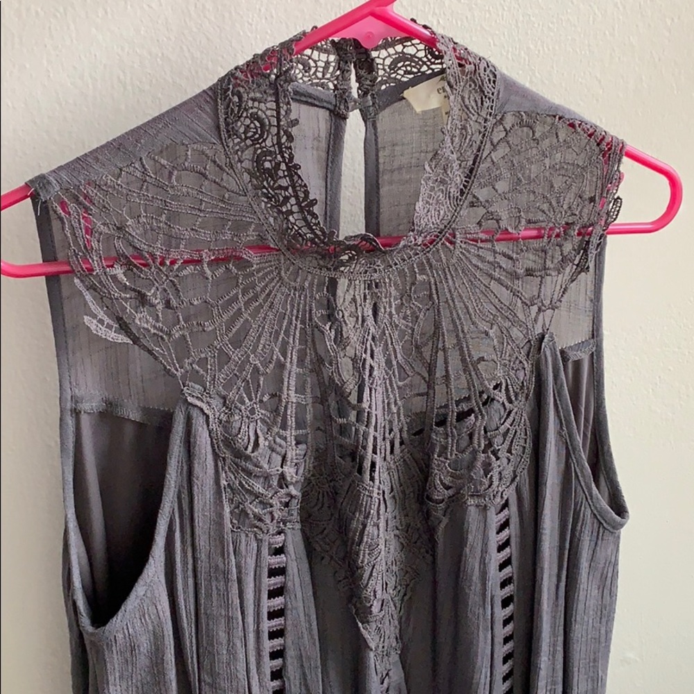 Grey dress with lace neckline.